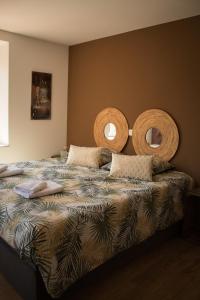 Postel nebo postele na pokoji v ubytování Gîte Chez Tim