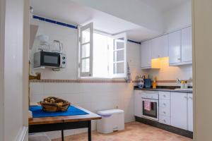 Kuchyň nebo kuchyňský kout v ubytování Live Puertito Casa Azul