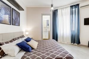A bed or beds in a room at BDC - Prestige 3Bdr 3Bath in Monti District