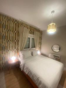 Posteľ alebo postele v izbe v ubytovaní SnD Rentals -Boutique apartments