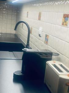 Kuchyňa alebo kuchynka v ubytovaní SnD Rentals -Boutique apartments