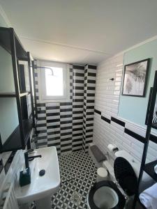 Kúpeľňa v ubytovaní SnD Rentals -Boutique apartments