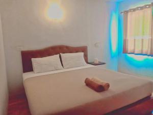 Postel nebo postele na pokoji v ubytování Boodsarin Hotel + 37 fotografií