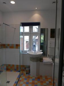 Koupelna v ubytování ROOMS BYTOM