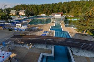 an overhead view of a resort with a swimming pool at Apartman Tatry in Nová Lesná