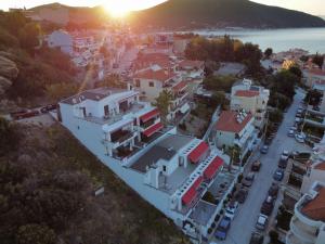 an aerial view of a city with a building at Aelia Apartments in N&eacute;a P&eacute;ramos