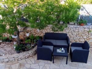 Vonkajšia záhrada v ubytovaní VILLA ANA ZIVOGOSCE-Apartment4