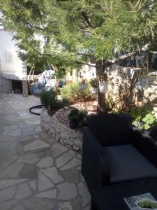 Vonkajšia záhrada v ubytovaní VILLA ANA ZIVOGOSCE-Apartment4