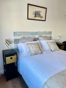 A bed or beds in a room at Home Triana
