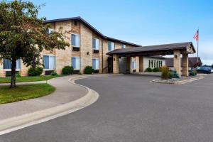 a building with a curvy road in front of it at Days Inn by Wyndham Hurley in Hurley