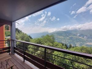 a balcony with a view of the mountains at Studio aux Arcs 1800 avec Balcon, 4 Couchages, Vue Mont Blanc - FR-1-346-308 in Arc 1800