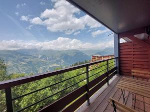 a balcony of a house with a view of the mountains at Studio aux Arcs 1800 avec Balcon, 4 Couchages, Vue Mont Blanc - FR-1-346-308 in Arc 1800 +6 photos