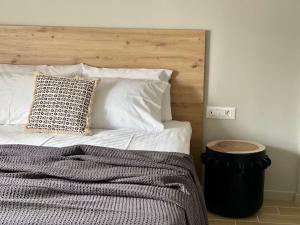 Tempat tidur dalam kamar di Campana’s Apartment