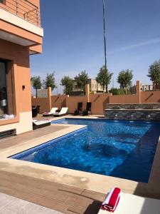 a swimming pool on top of a building at Villa Arabic House Pool & SPA in Marrakesh