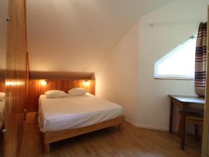 Ένα ή περισσότερα κρεβάτια σε δωμάτιο στο Appartement Duplex pour 5 à Val Cenis le Haut - À 200m des Pistes - FR-1-508-215