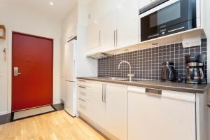 Küche/Küchenzeile in der Unterkunft ApartDirect Solna