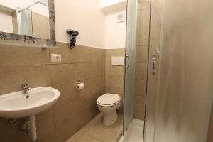 A bathroom at Guest House Minas