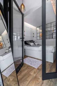 Poschodová posteľ alebo postele v izbe v ubytovaní Premium Apartment with Air Conditioning, city heart in Cracow