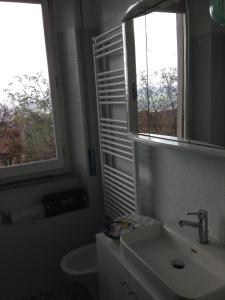 Ein Badezimmer in der Unterkunft A Casa di Ilaria