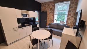Fotografia z galérie ubytovania Szczytowa Kamienica Apartamenty Blisko Centrum v destinácii Čenstochová