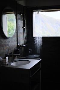 a bathroom with a sink and a window at Les Cèdres - Hôtel - Restaurants - Spa in Saint-Sorlin-dʼArves +44 photos
