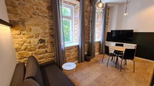 Fotografia z galérie ubytovania Szczytowa Kamienica Apartamenty Blisko Centrum v destinácii Čenstochová
