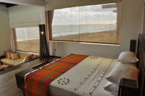Katil atau katil-katil dalam bilik di Laya Safari Resorts & Spa