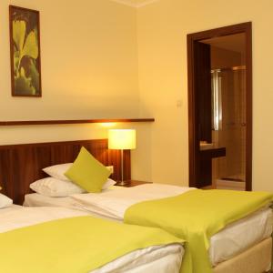 Letto o letti in una camera di Hotel Ginkgo