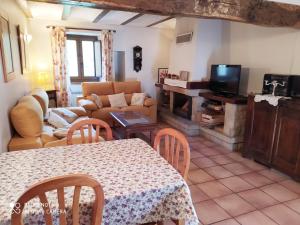 a living room with a table and a couch at Araiztar in Irañeta