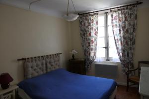 Letto o letti in una camera di la métairie de Martine