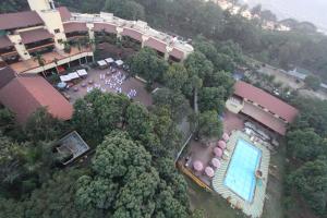 an overhead view of a resort with a swimming pool at Damanganga Valley Resort Silvassa in Silvassa