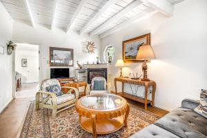 a living room with a couch and a table at Mendocino Dunes - Sand Dollar in Fort Bragg