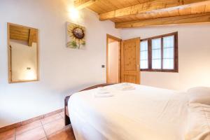 Posteľ alebo postele v izbe v ubytovaní Incanto Walser Apartments Ronco