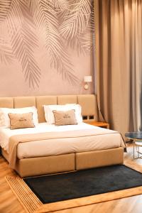 Een bed of bedden in een kamer bij White Hill Hotel, SPA & Conferences