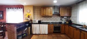 A kitchen or kitchenette at Casa Rural La Torreta en El Rincón de Ademuz