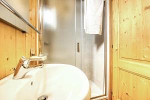 Posteľ alebo postele v izbe v ubytovaní Incanto Walser Apartments Ronco