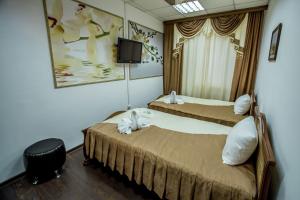 Cama o camas de una habitación en Welcome Minihotel