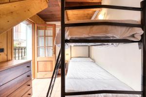 Posteľ alebo postele v izbe v ubytovaní Incanto Walser Apartments Ronco