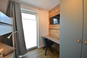 Postel nebo postele na pokoji v ubytování Ferienwohnung STRAND PIET