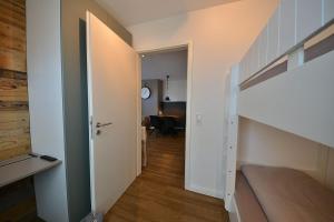 Postel nebo postele na pokoji v ubytování Ferienwohnung STRAND PIET