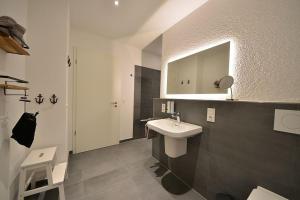 Koupelna v ubytování Ferienwohnung STRAND PIET + 12 fotografií