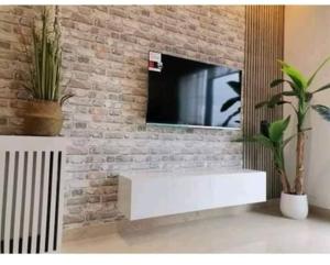 TV a/nebo společenská místnost v ubytování Superbe Appartement kantaoui sousse