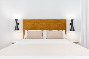 Posteľ alebo postele v izbe v ubytovaní iloftmalaga Santa María