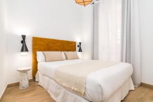 Posteľ alebo postele v izbe v ubytovaní iloftmalaga Santa María