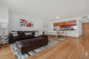 A seating area at Miami condo with city & ocean views! Sleep up to 6!