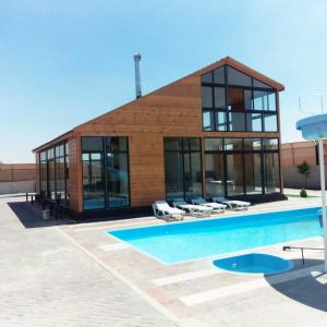 Πισίνα στο ή κοντά στο The royal cottage Amman