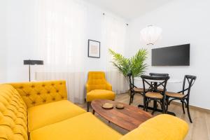 Televízia a/alebo spoločenská miestnosť v ubytovaní iloftmalaga Santa María