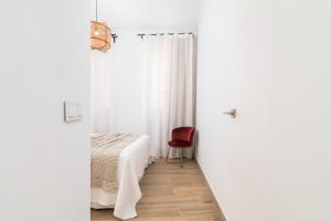 Posteľ alebo postele v izbe v ubytovaní iloftmalaga Santa María