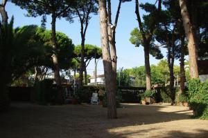 A garden outside Enjoy your holidays 300m to the Mediterranean sea at Villa DIVALI