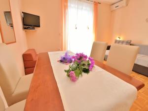 TV a/nebo společenská místnost v ubytování Apartments Katarina
